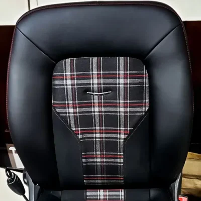 Red plaid inserts & black lumbar sections.